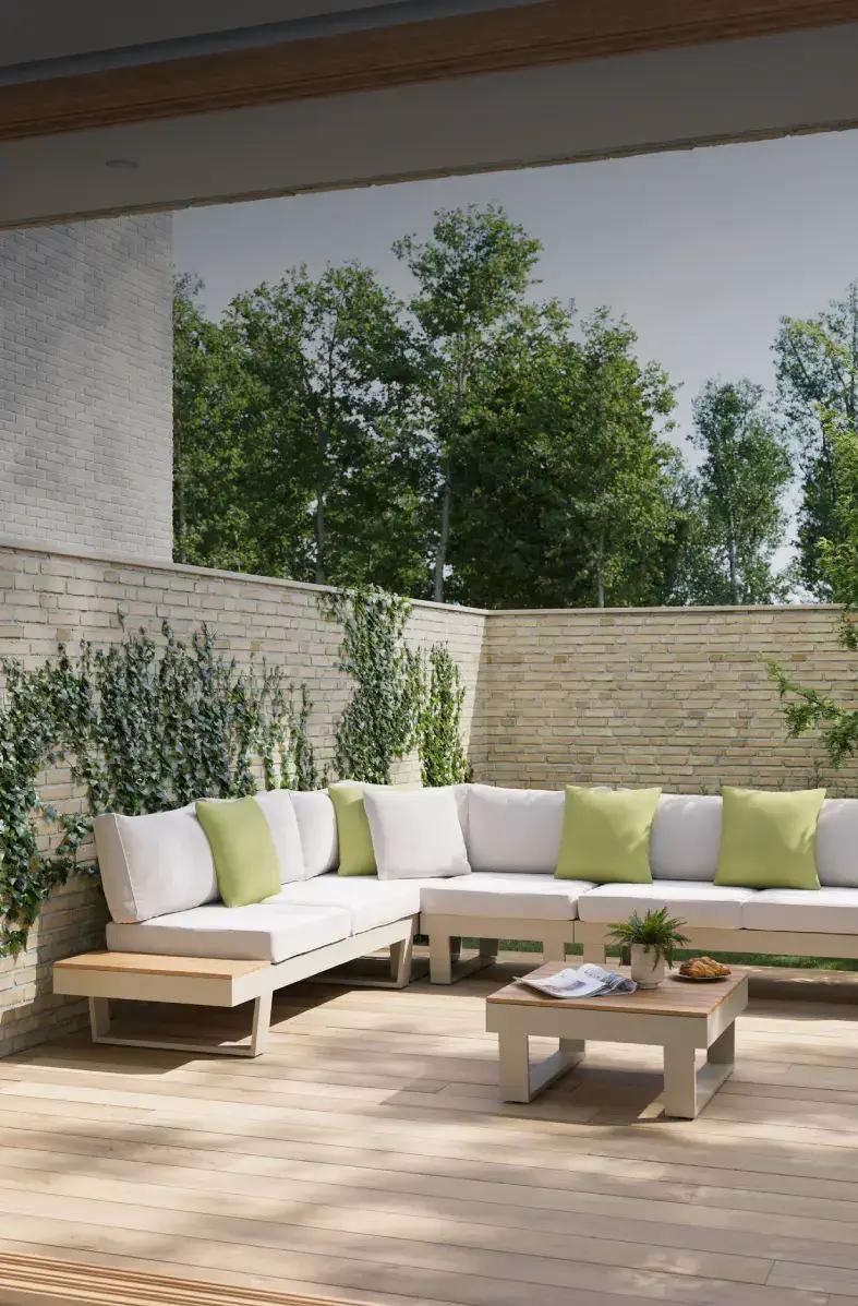 Beige Vinci Basics loungeset van Exterioo tuinmeubelen op een zonnig terras